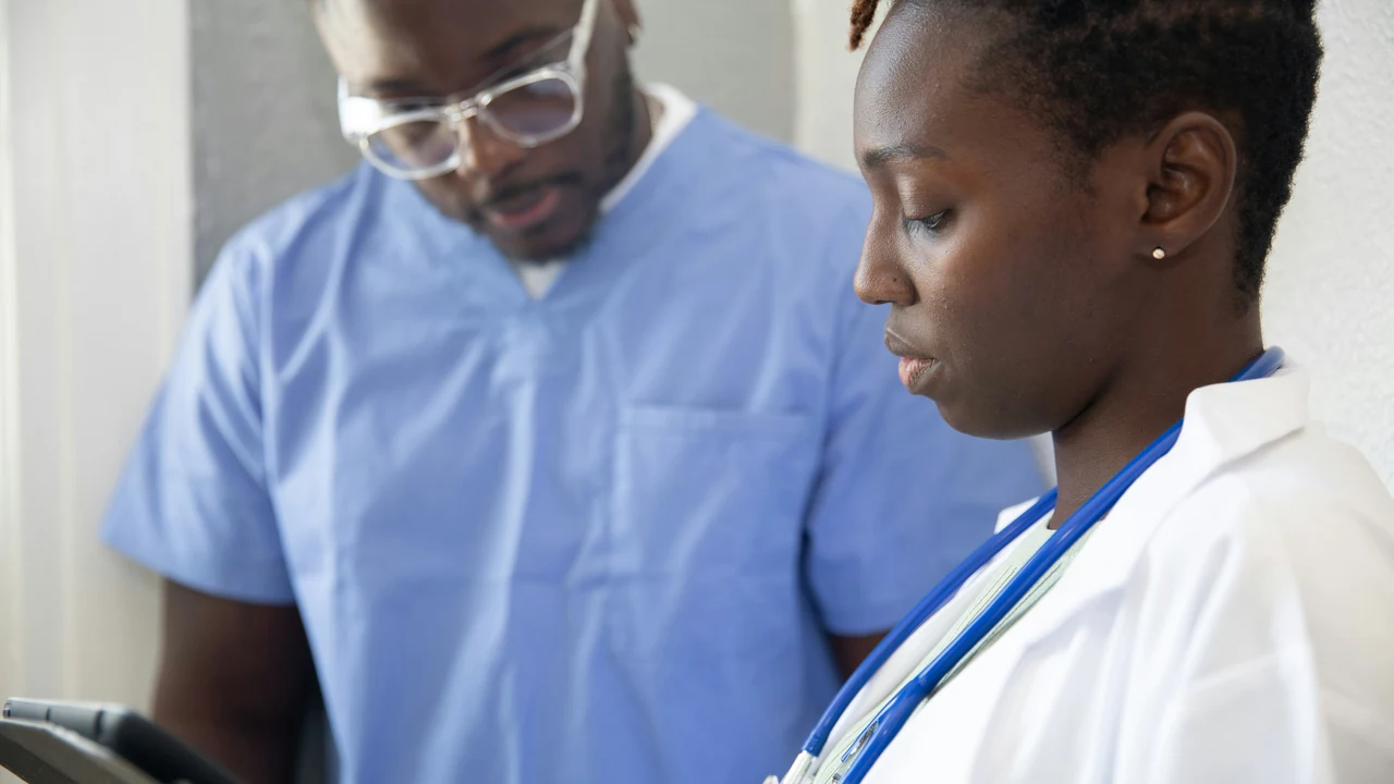 Doctor speaking with a patient.