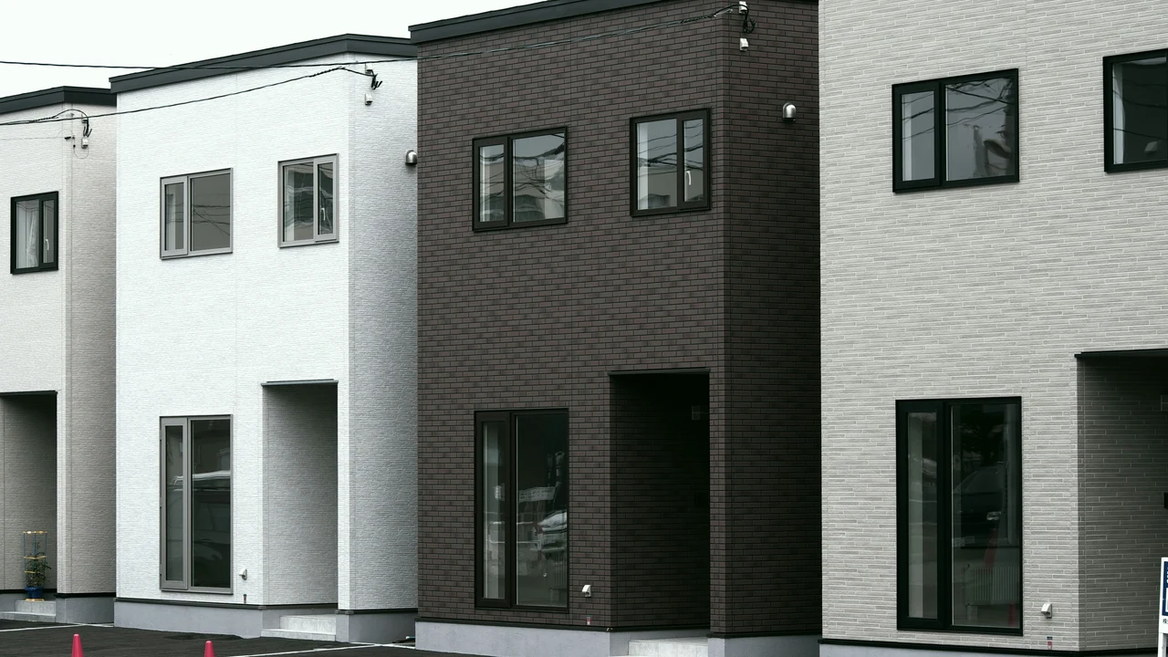 Authentic photograph of brown and white concrete building.