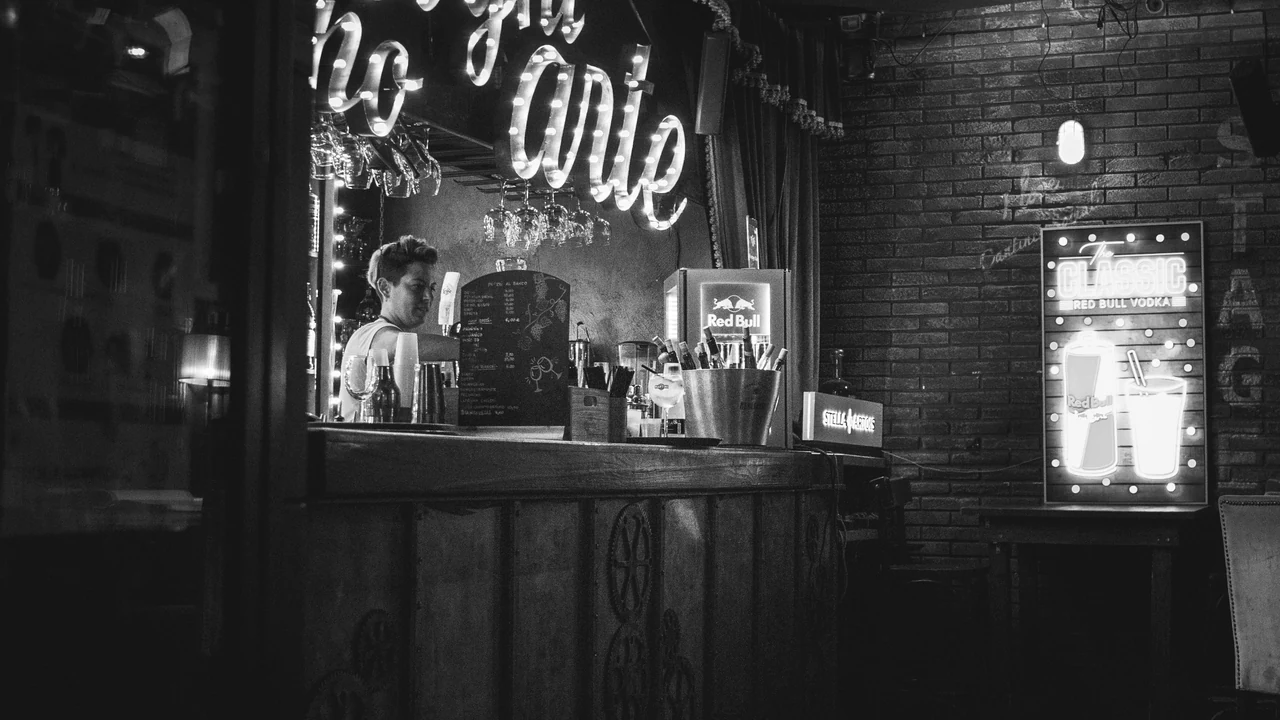 Authentic photograph of grayscale photo of store front.