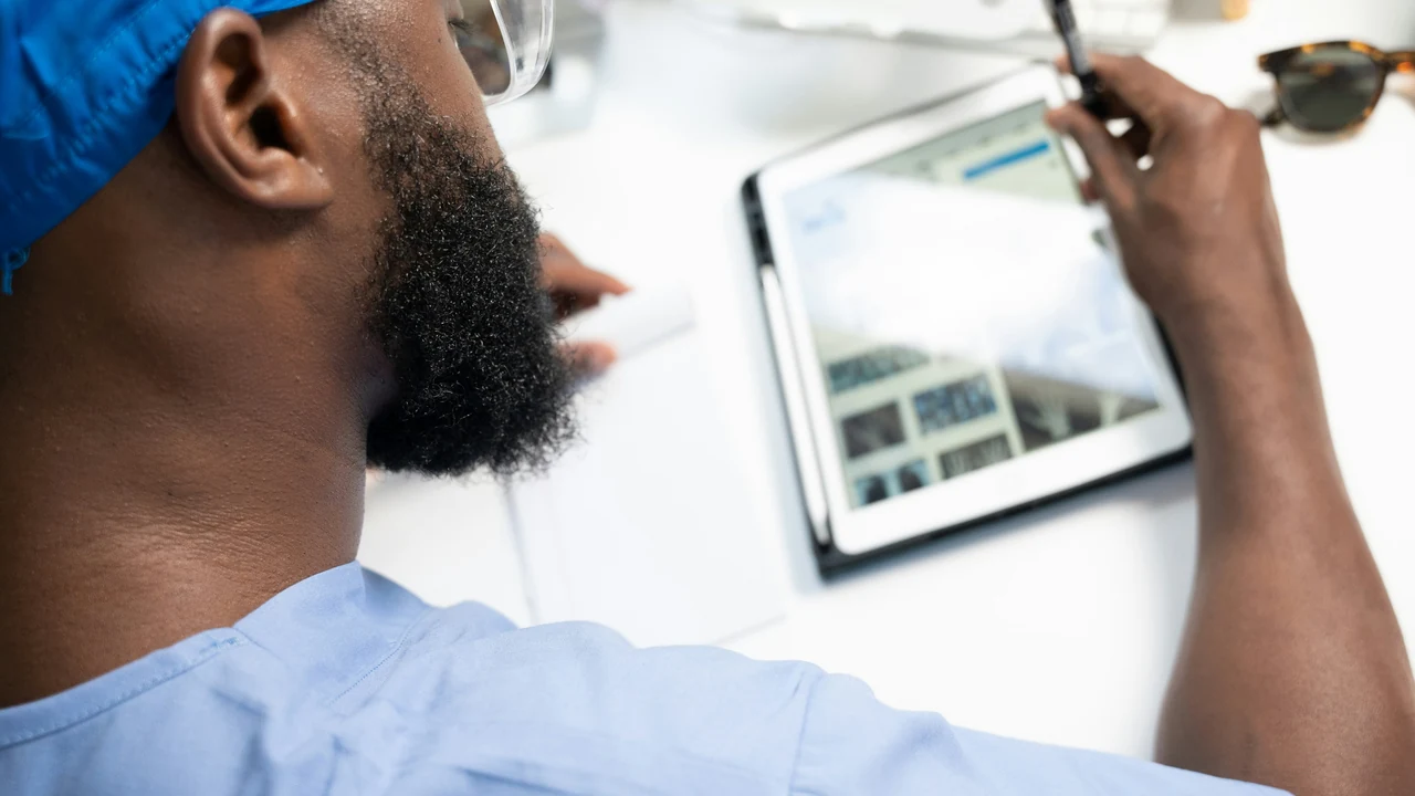 Field professional using a tablet.