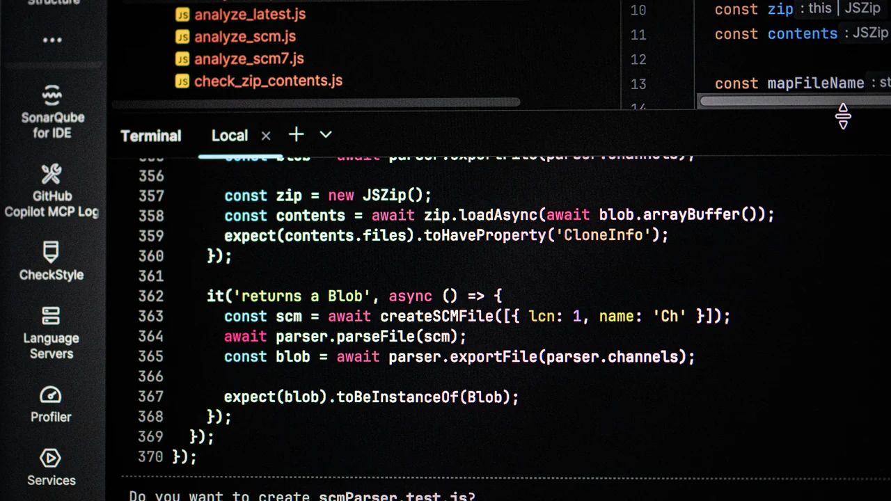 Authentic photograph of computer screen displaying code and terminal output.