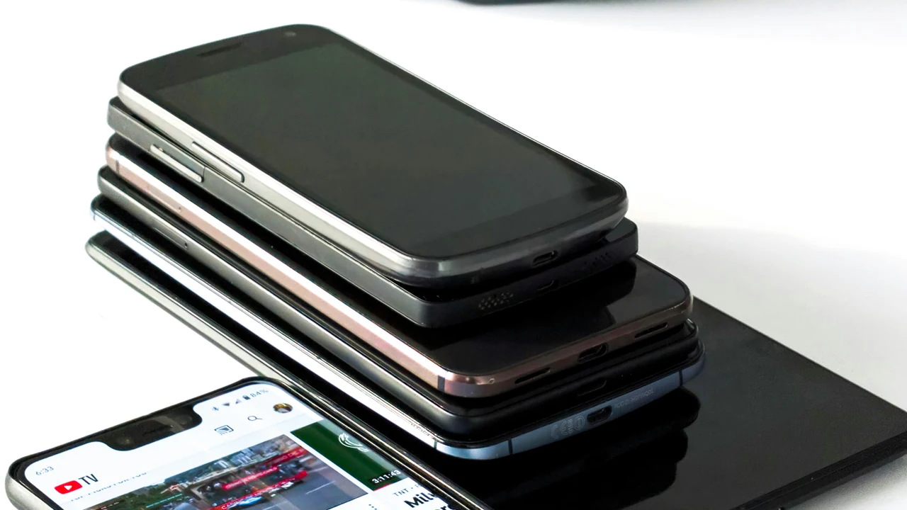 Authentic photograph of piled phones.