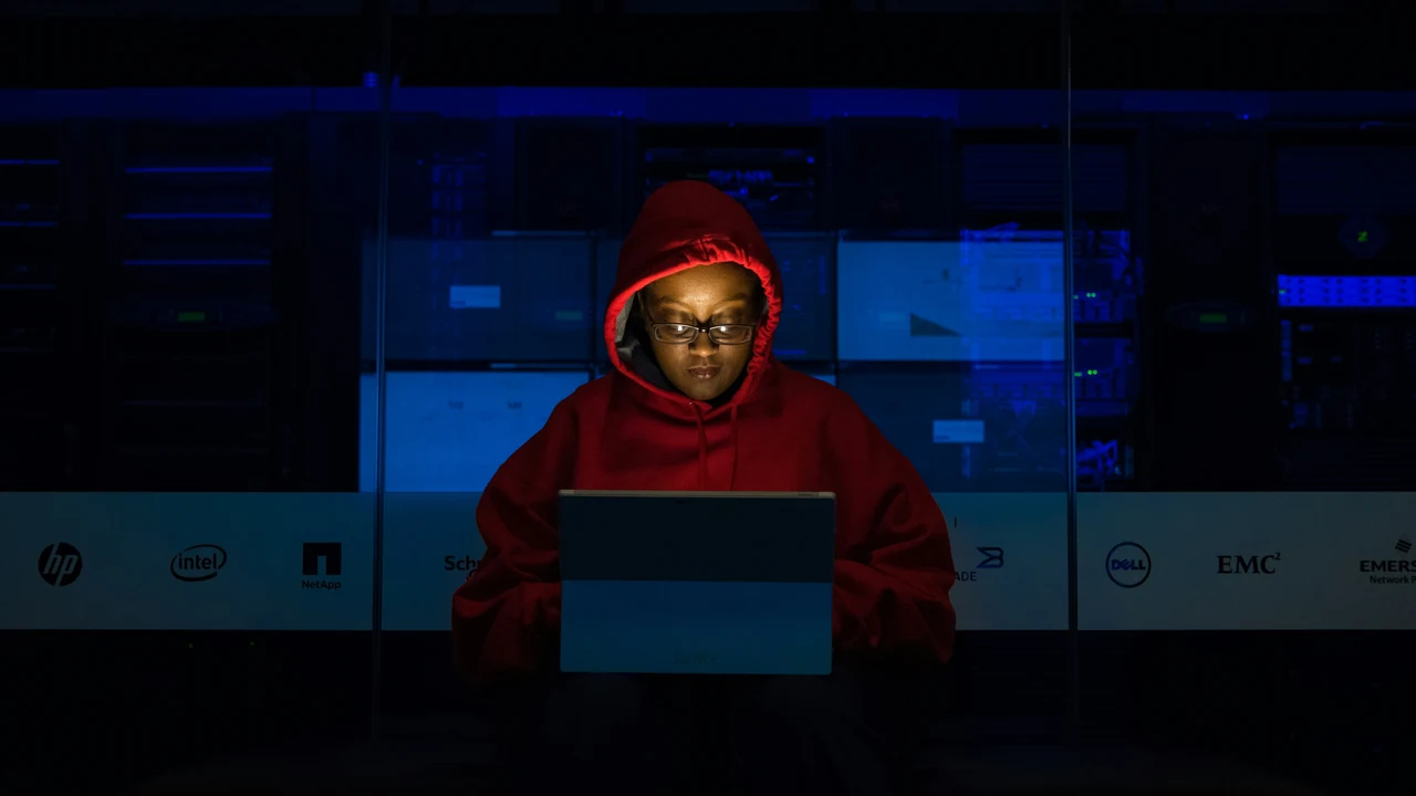 Authentic photograph of woman using laptop.