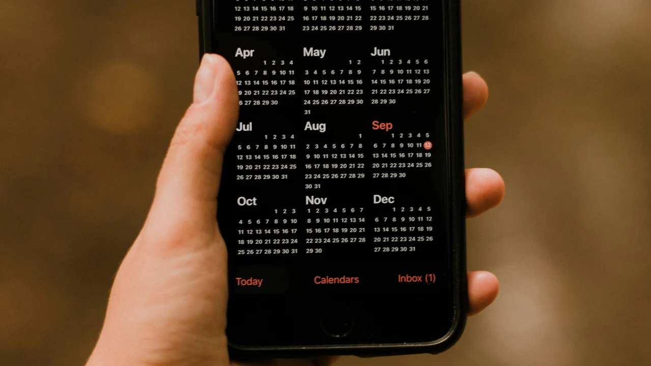 Person holding black android smartphone.