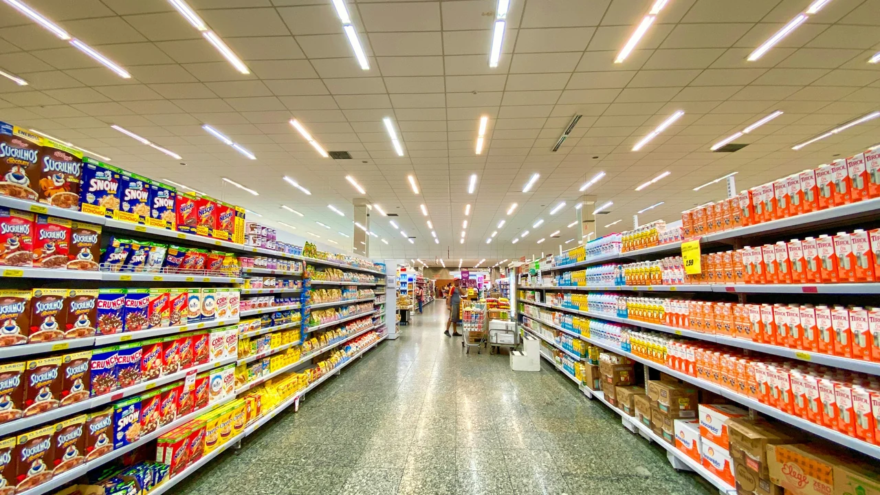 Retail shelves stocked with products for shoppers.