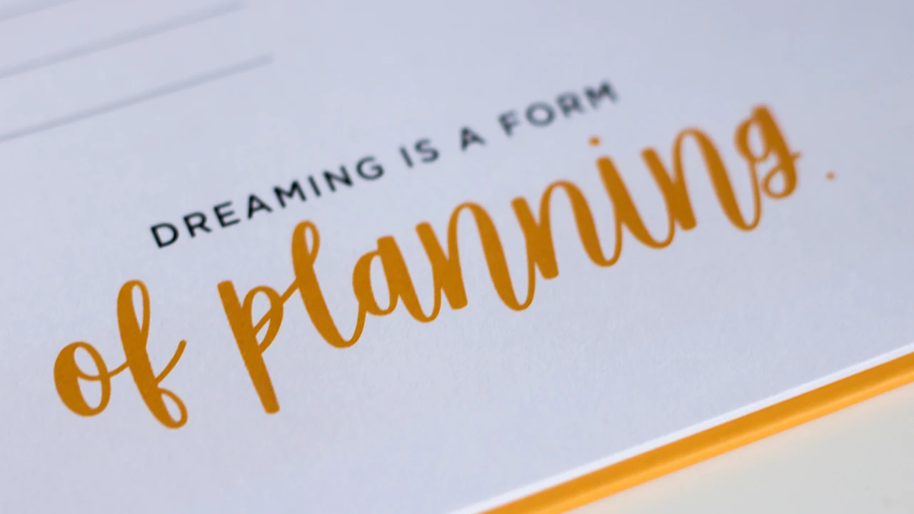 Organized planning document and handwritten notes on a desk.