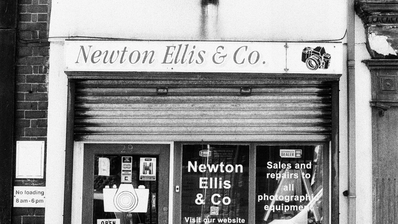 Independent retail storefront with products displayed inside.