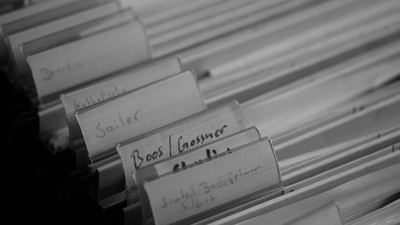 Organized paper records used to maintain consistent business information.