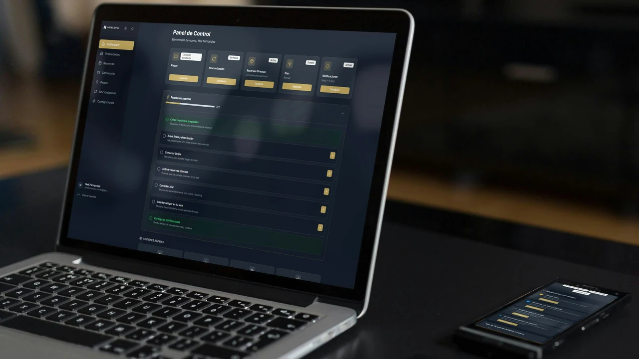 Laptop and smartphone used to compare website performance data.