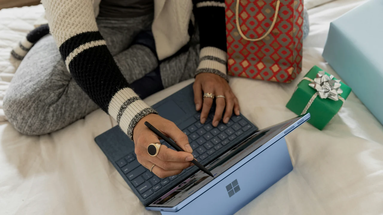 A person using a laptop.